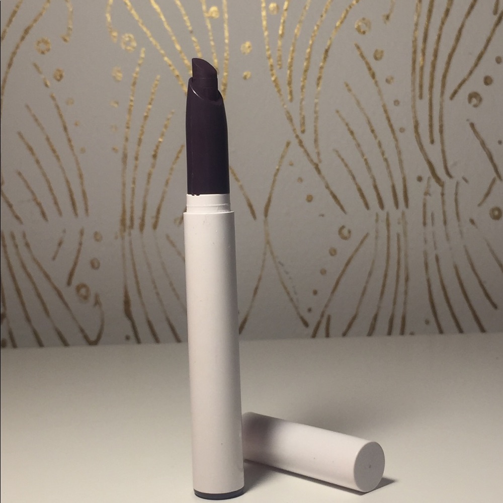 Colour Pop dark purple lipstick